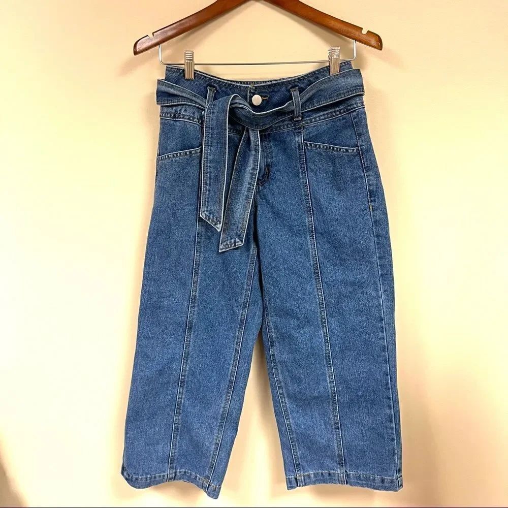 Refuge high waisted jeans with tie belt.   Size 4